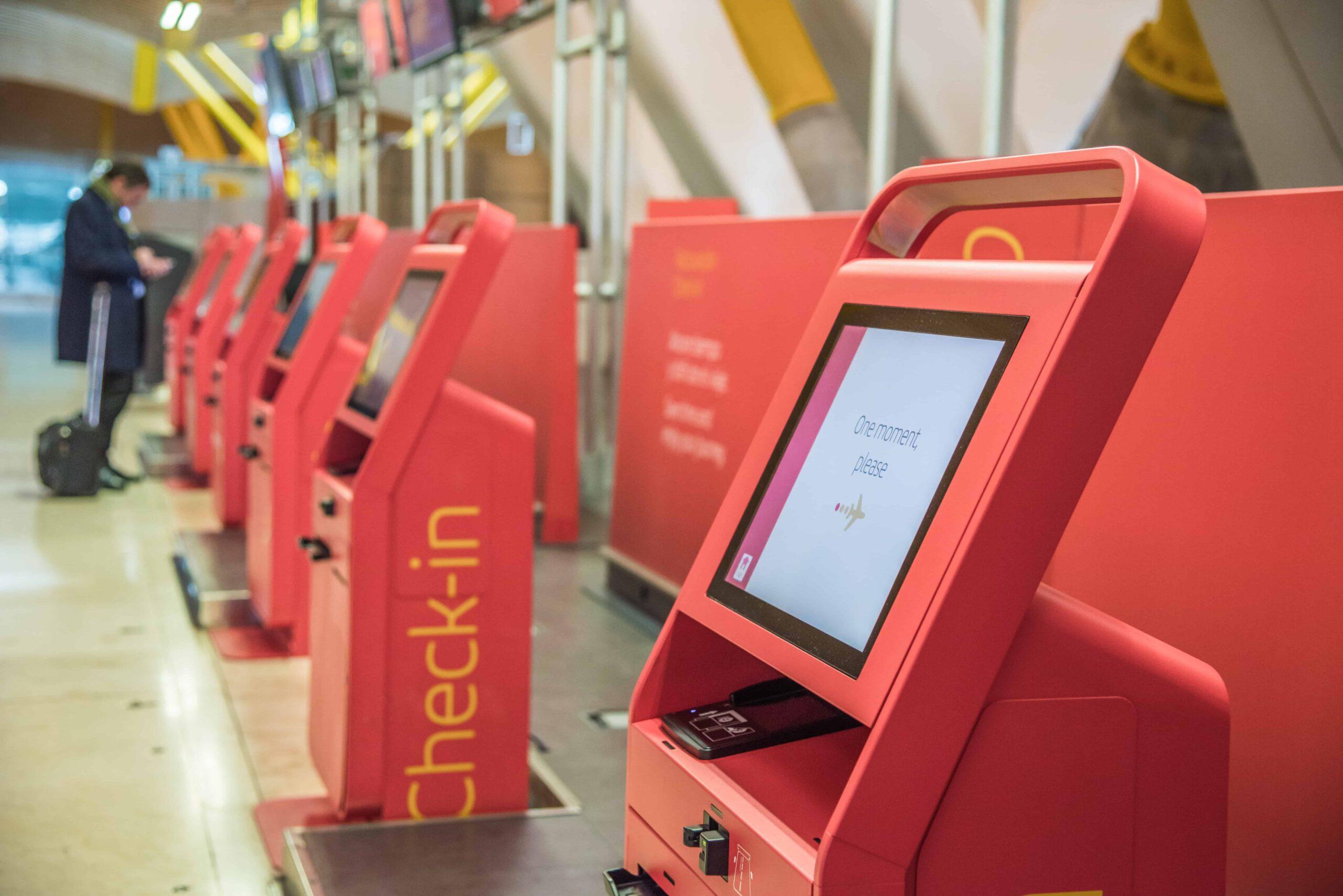 red-self-machines-checkin-service-airport-kiosk-min